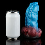 Curved blue silicone toy with red end, single-piece design.