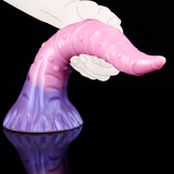 Silicone tentacle dildo, octopus butt plug—close hand holding the base