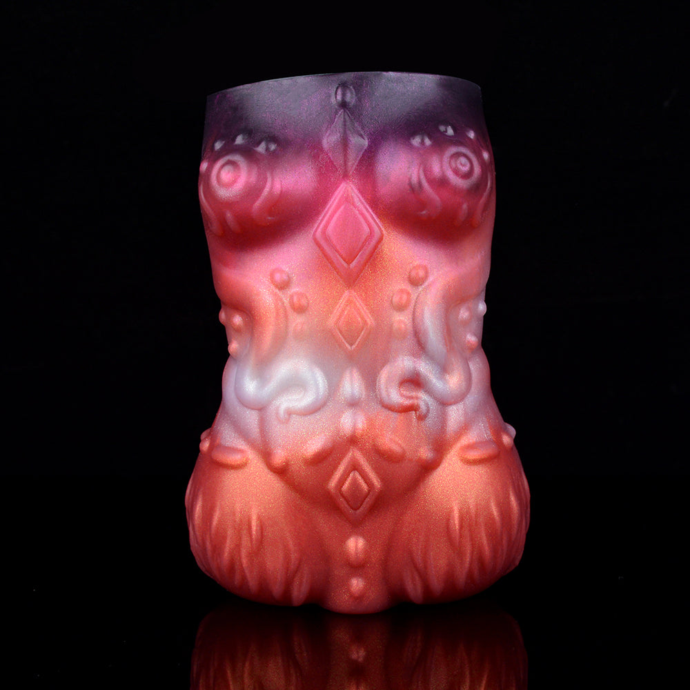 Twin Ember clutch front view, sculpted pattern on red and purple body