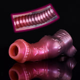 Pink penis extender sleeve with visible inner channel, plus cutaway diagram