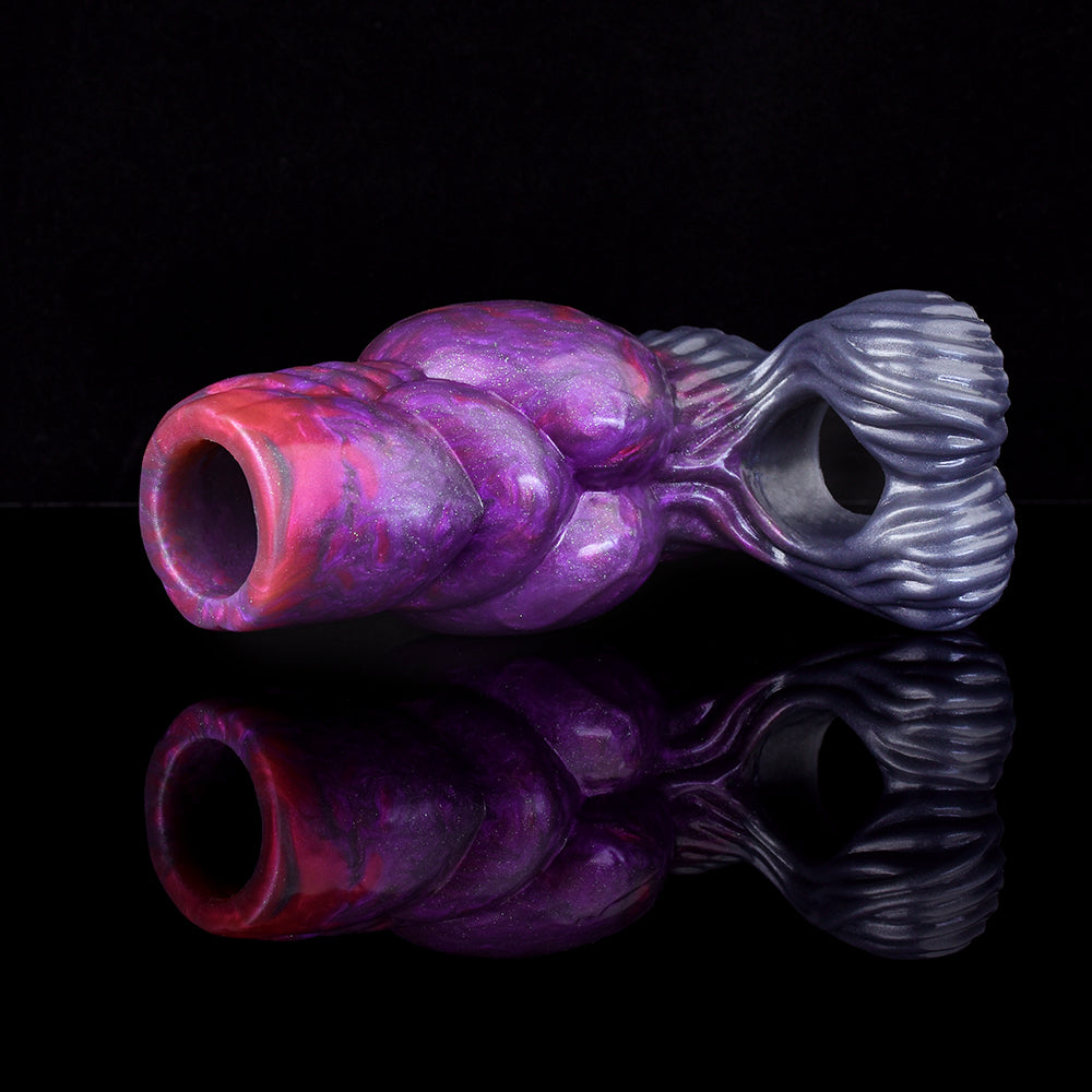 Purple galaxy silicone knot sleeve with ridged blue tail, open ring end