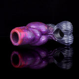 Purple galaxy silicone knot sleeve with ridged blue tail, open ring end