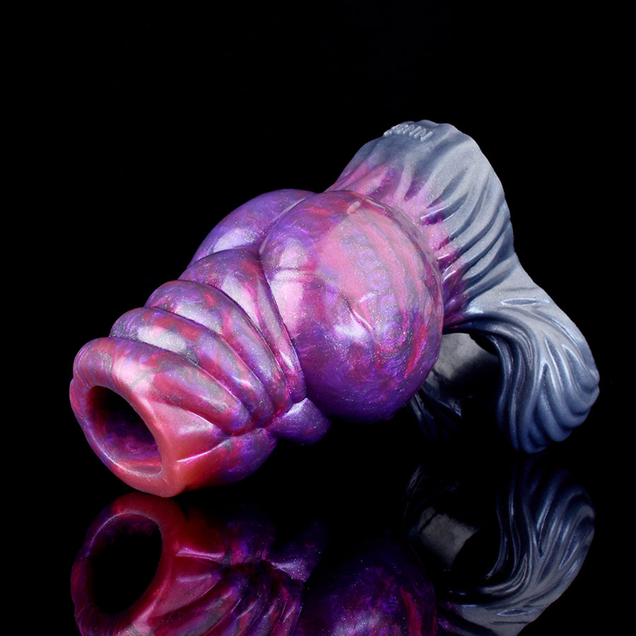 Silicone knot sleeve with purple ridged knot and gray ribbed tail, side view