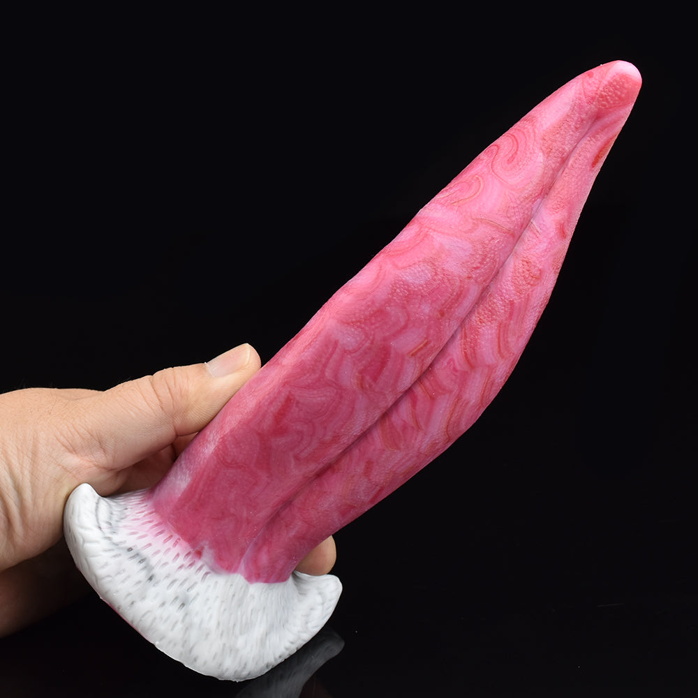 Pink textured silicone vibrator tongue held in hand with white flared base