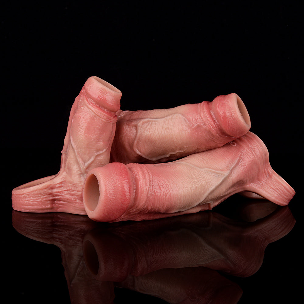 Cock extender sleeve with scrotum ring; light pink; openings visible from above
