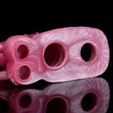 Pink monster dragon sleeve underside with three circular holes and textured ridges