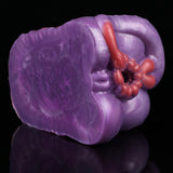 Purple translucent novelty hand mold with red fingers, glossy surface
