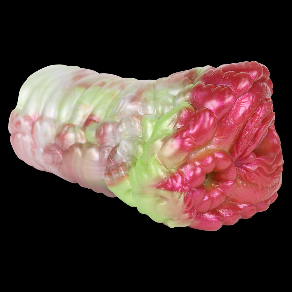 Dragon head end of masturbator, textured pink-and-lime ridges