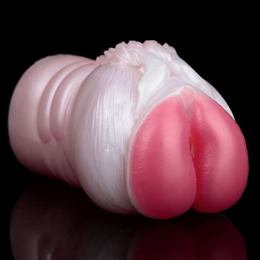 Pink and white sex toy sleeve front end with rounded pink insert