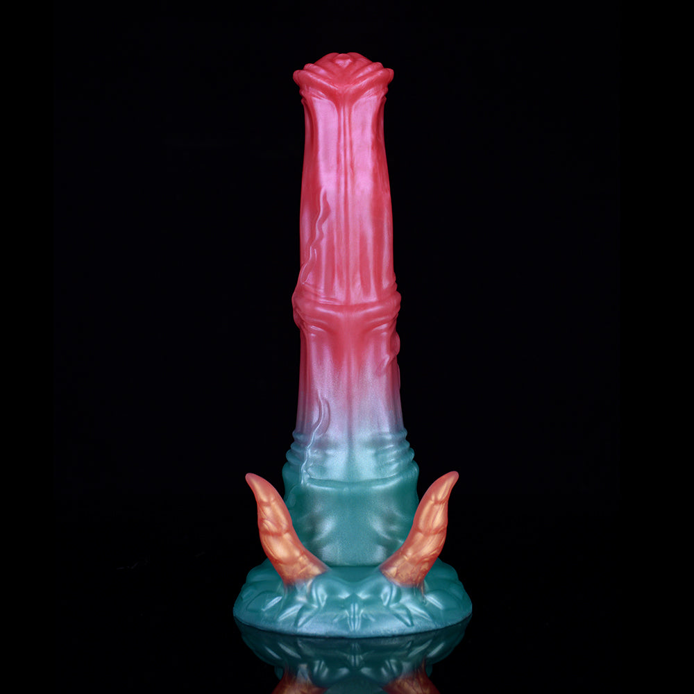 Dildo with demon horns front view, pink top column and teal base with two orange horns