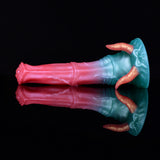 Dildo with demon horns, teal head with three orange horn tips and pink mirrored shaft