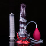 Fantasy squirting dildo with red base, clear tube and measurement cylinder