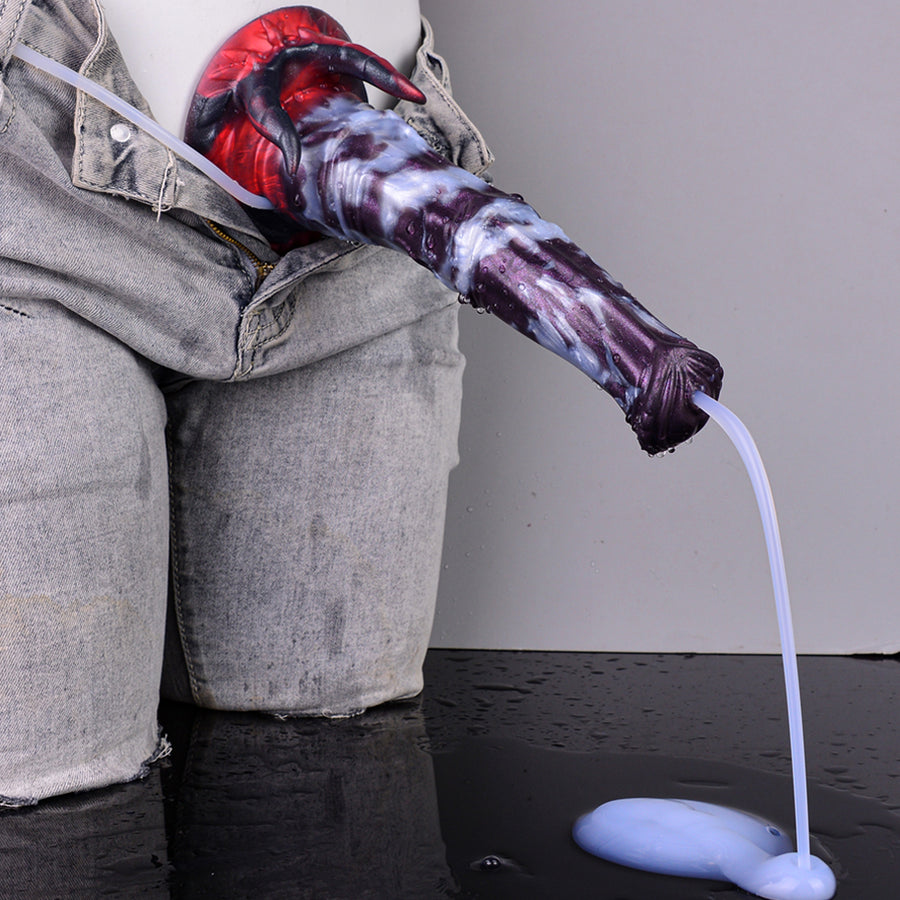 Fantasy beast squirting dildo in gray pants, red and blue striped body with tube