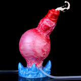 Aufblasbarer rot/rosa Dildo mit Cum-Tube, blaue Basis, weiße Flüssigkeit am Ende