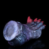 Blue dragon talon sex toy with red claw tips, side view
