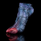 Blue dragon talon sex toy with red claw tip, back view