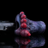 Blue dragon talon sex toy with red claw tips, open end shown from side