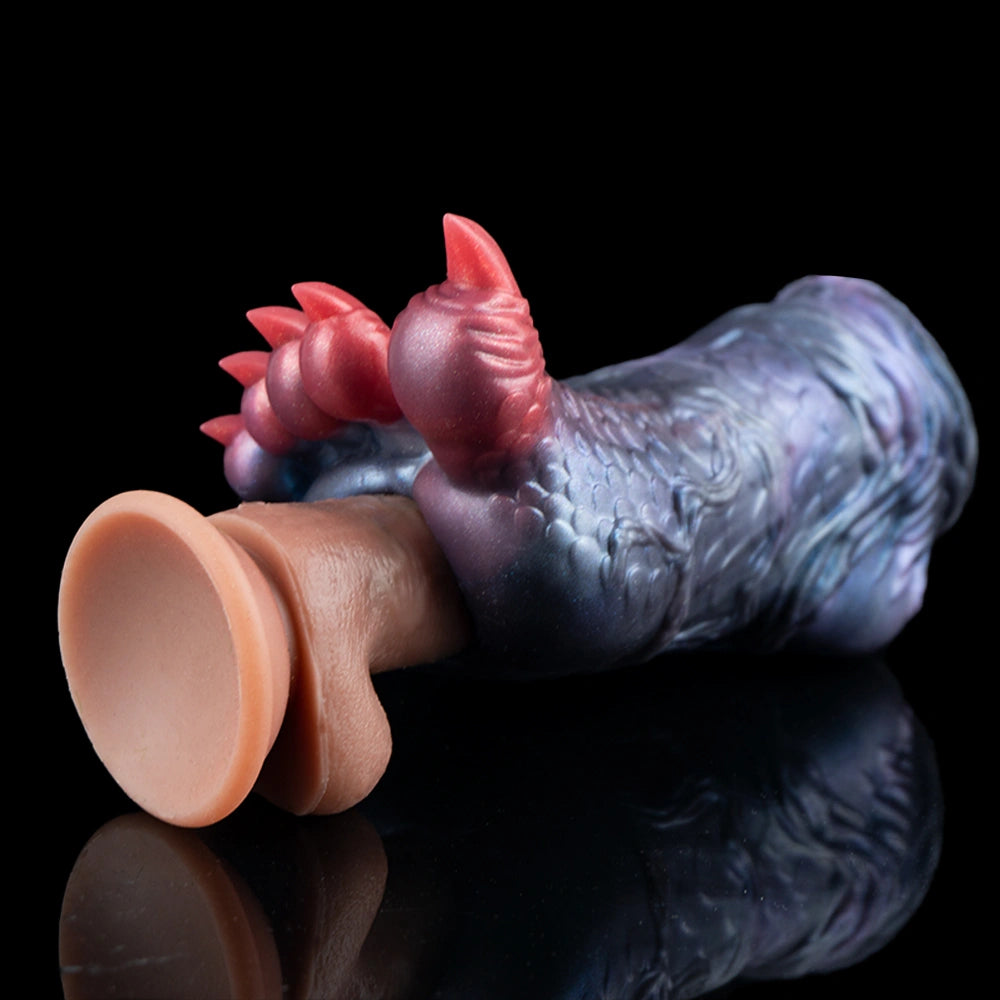 Blue dragon talon sex toy with red claw tips, open end visible