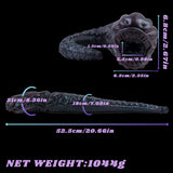 Snake creature toy showing length and sizing markings on a dark purple coiled body