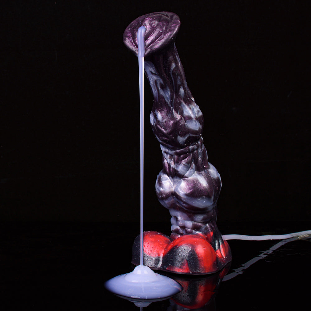 Lila Squirting-Dildo aufrecht, transparentes Schlauchrohr, weiche weiße Flüssigkeit austretend