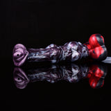 Violetter Dildo mit rot-schwarzer Basis und großen Flanschen, seitliche Ansicht