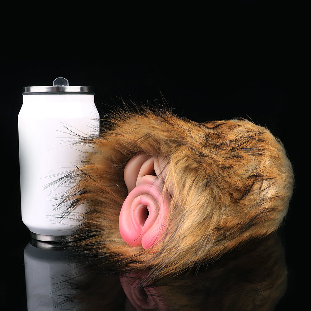 Brown furry masturbator with pink dual tip openings on a curved body
