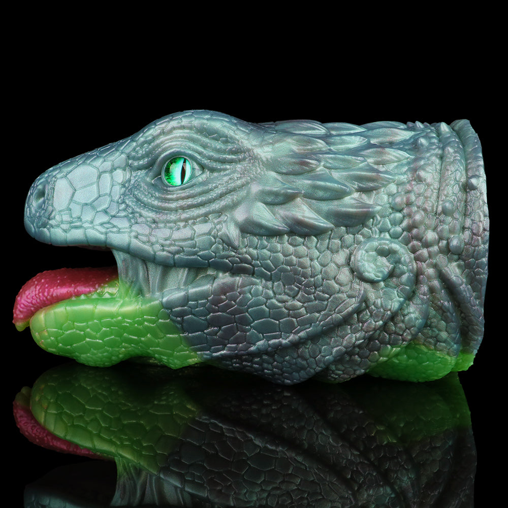 Dragon Fleshlight close-up of head and glowing green eye, green base and pink opening