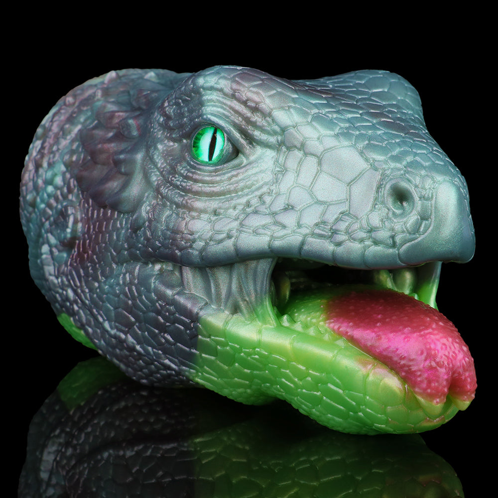 Whisper Dragon single-hole fleshlight, front close-up with pink tongue and green inner opening