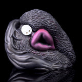 Dual-hole animal masturbator head with white control port, dark gray textured