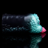 Teal alien stroker with long dark textured tube and pink bulb end, side profile