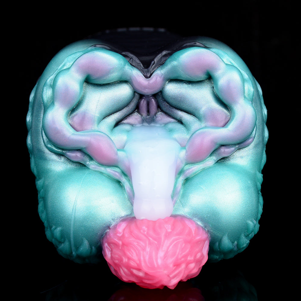 Teal alien stroker with open mouth, pink inner texture, and ridged cheeks