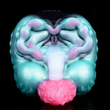 Teal alien stroker with open mouth, pink inner texture, and ridged cheeks