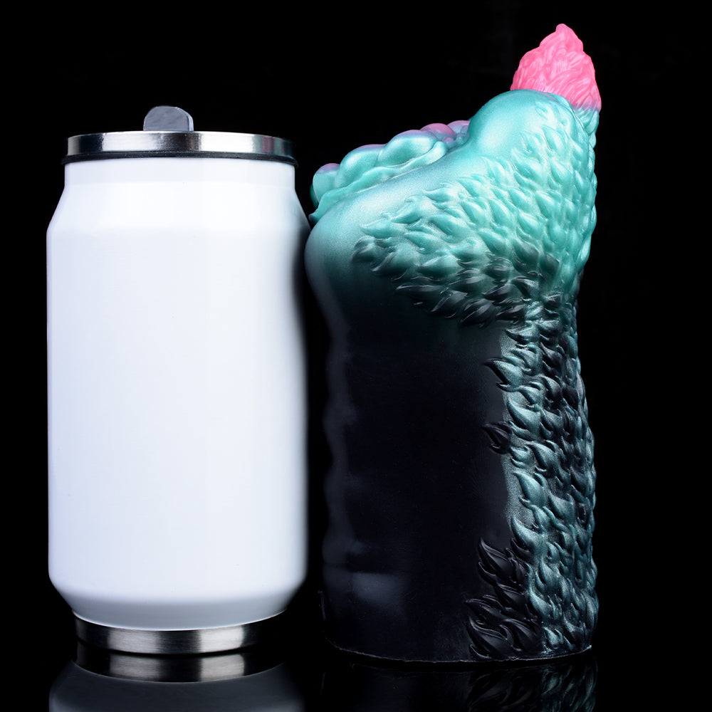 Teal and dark alien stroker with pink tail-like tip, textured scaly back view