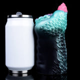 Teal and dark alien stroker with pink tail-like tip, textured scaly back view