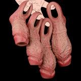 Set of realistic penis sleeves with varying lengths, textured light pink finish