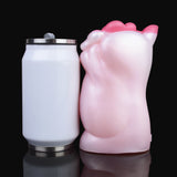 Pink ridged wombat pocket masturbator with smooth white body, angled side view