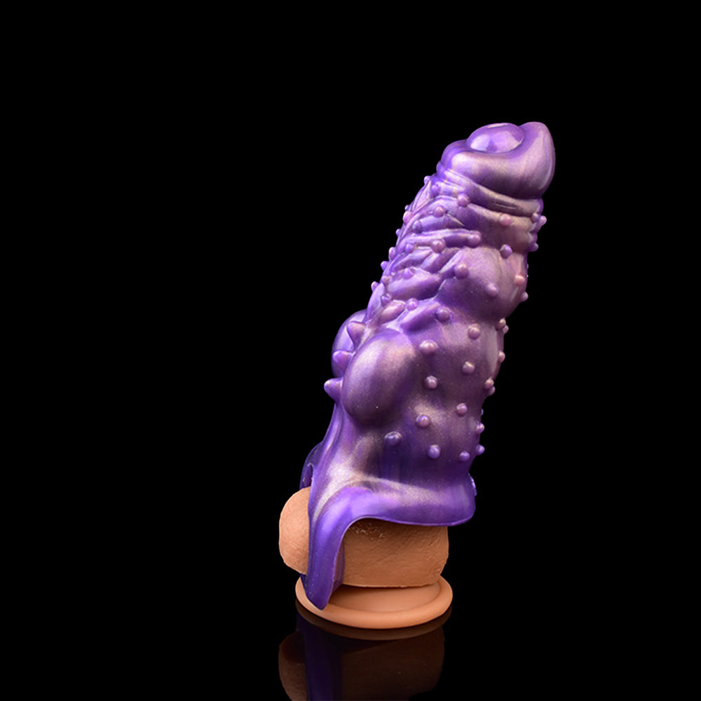 Purple dragon ribbed sheath extender, ridges and nubs, side view with curved tip