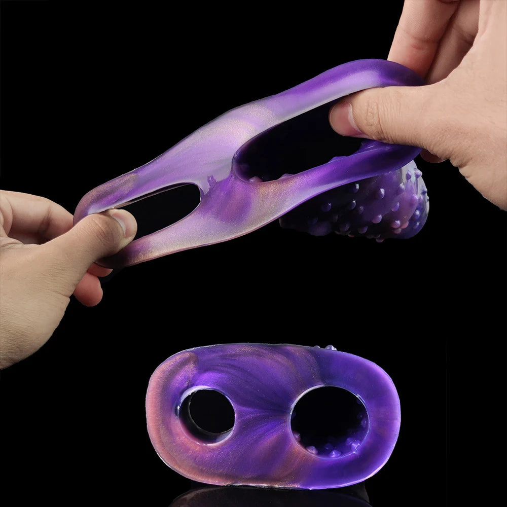 Purple dragon ribbed sheath extender, front openings, held and shown from side