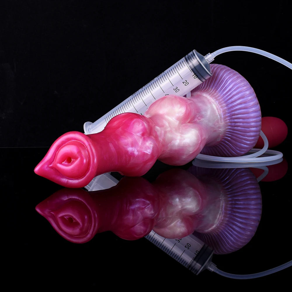 Yaksha Hundedildo mit Messskala und Schlauch, pink-lila, realistische Details.