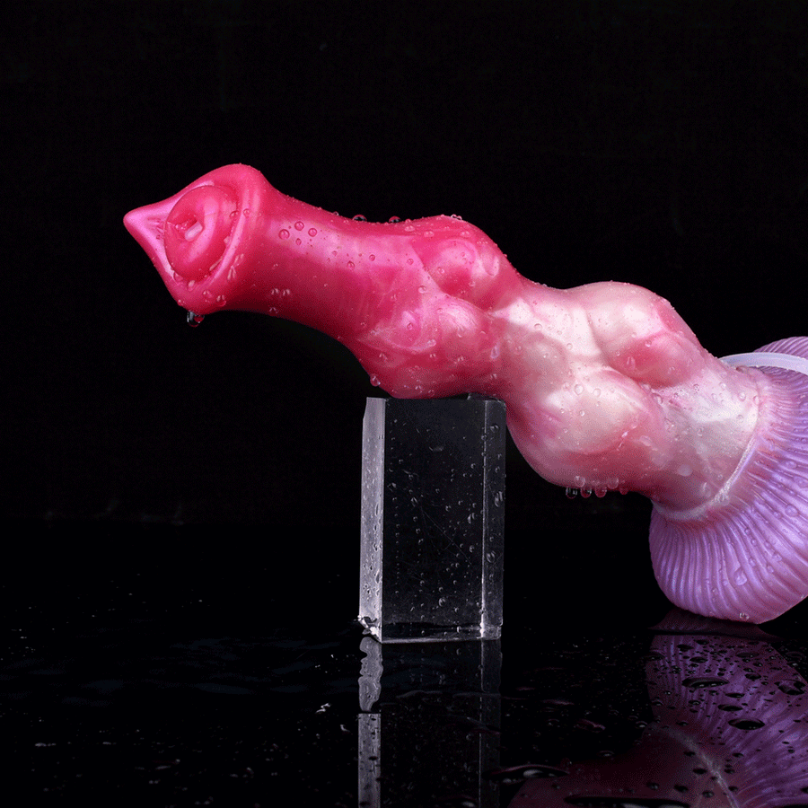 Pink canine-shaped sex toy with purple ridged base and light-blue tether on stand