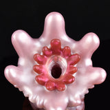 Octopus suction-ring opening on Yoyo the Tentacle, pink textured body with red tentacle details