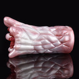 Yoyo the Tentacle octopus stroker, side view of glossy pink body with sculpted tentacle ridges