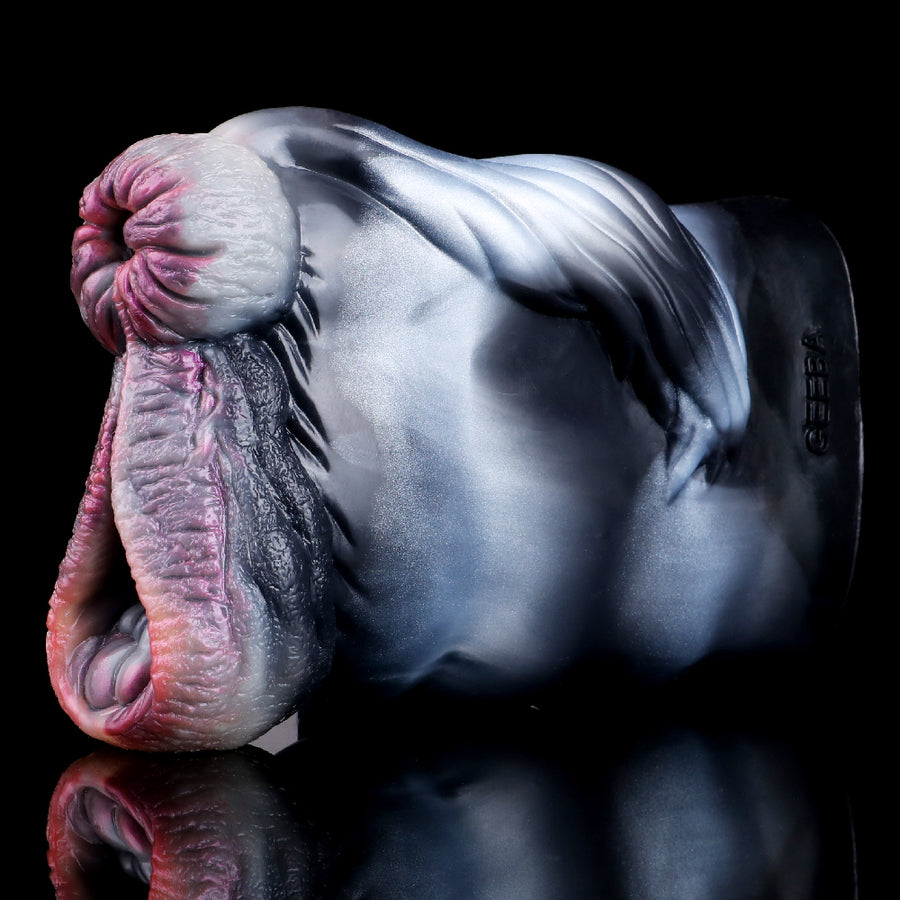 Two-hole animal-style masturbator side view showing pink mouth opening and dark inner slit
