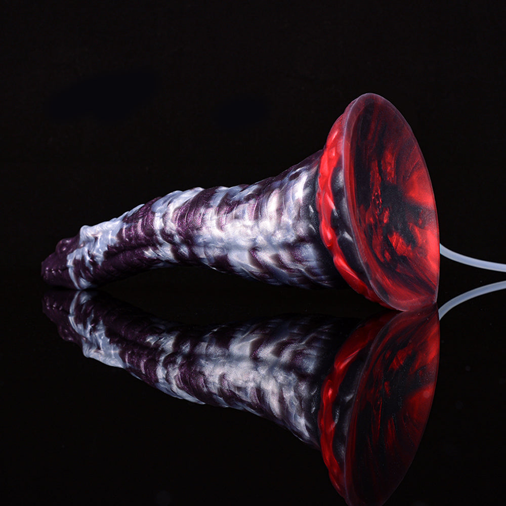 Purple-and-white dildo with red base suction cup and clear tube attachment