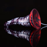 Purple-and-white dildo with red base suction cup and clear tube attachment