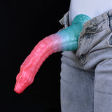 Curved dragon-snake dildo in pink and teal, textured scales, bulbous base