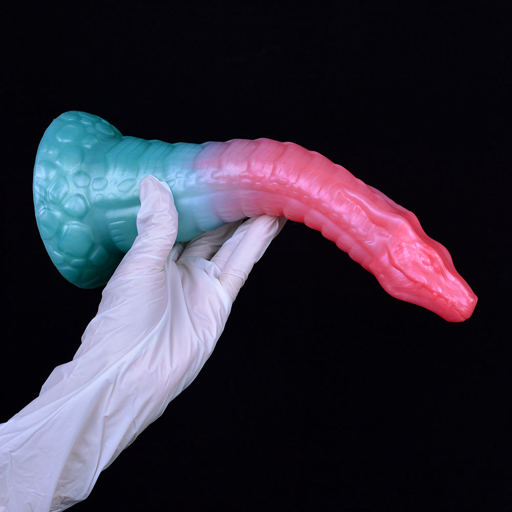Teal-and-pink dragon-snake dildo with bulbed base, curved body, textured scales