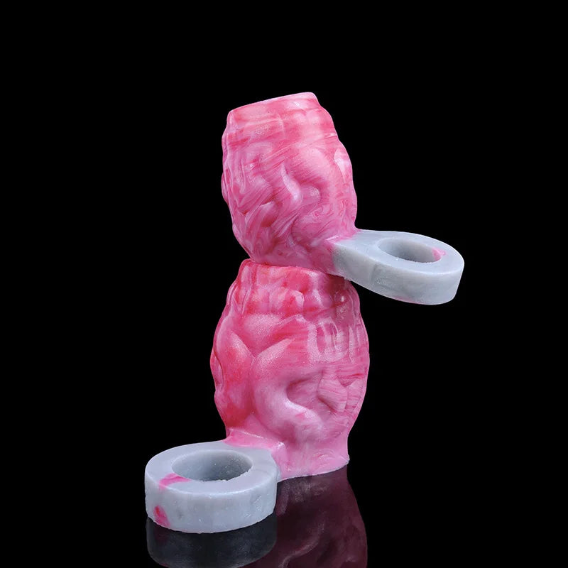 Pink ribbed sleeve ring with gray base loop and central opening