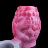 Close-up of pink ribbed sleeve ring texture and rounded shape
