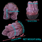 Pink silicone octopus-shaped toy with bubble-studded tentacles and curled top